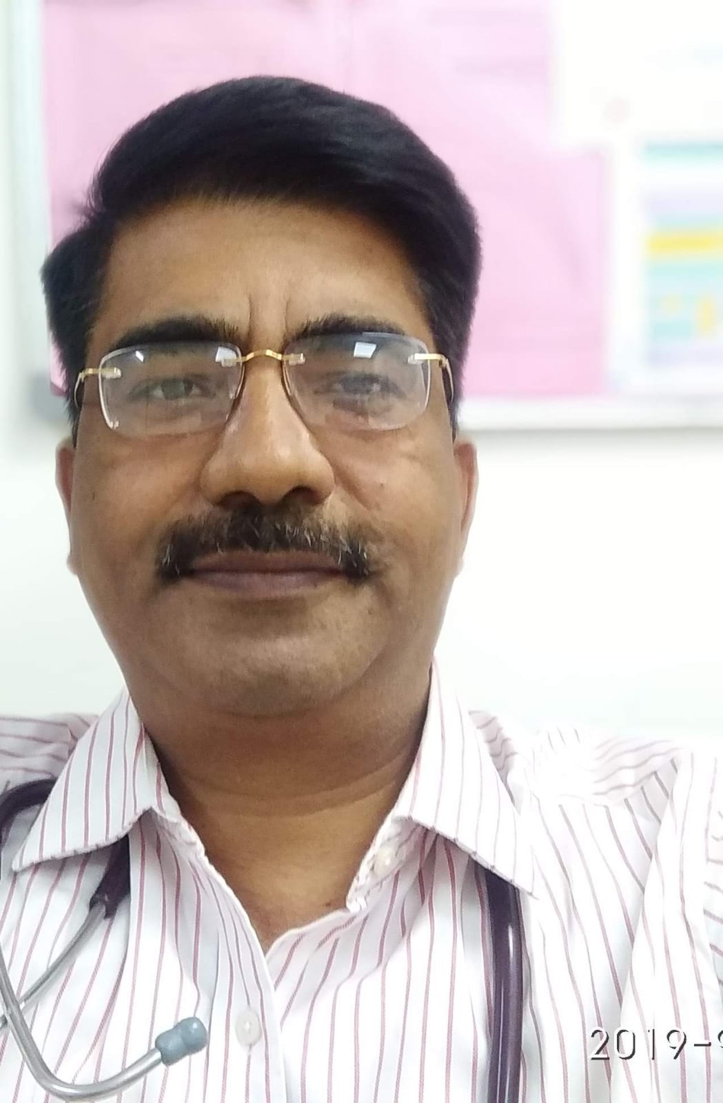 Dr. Ojha in his CLinic