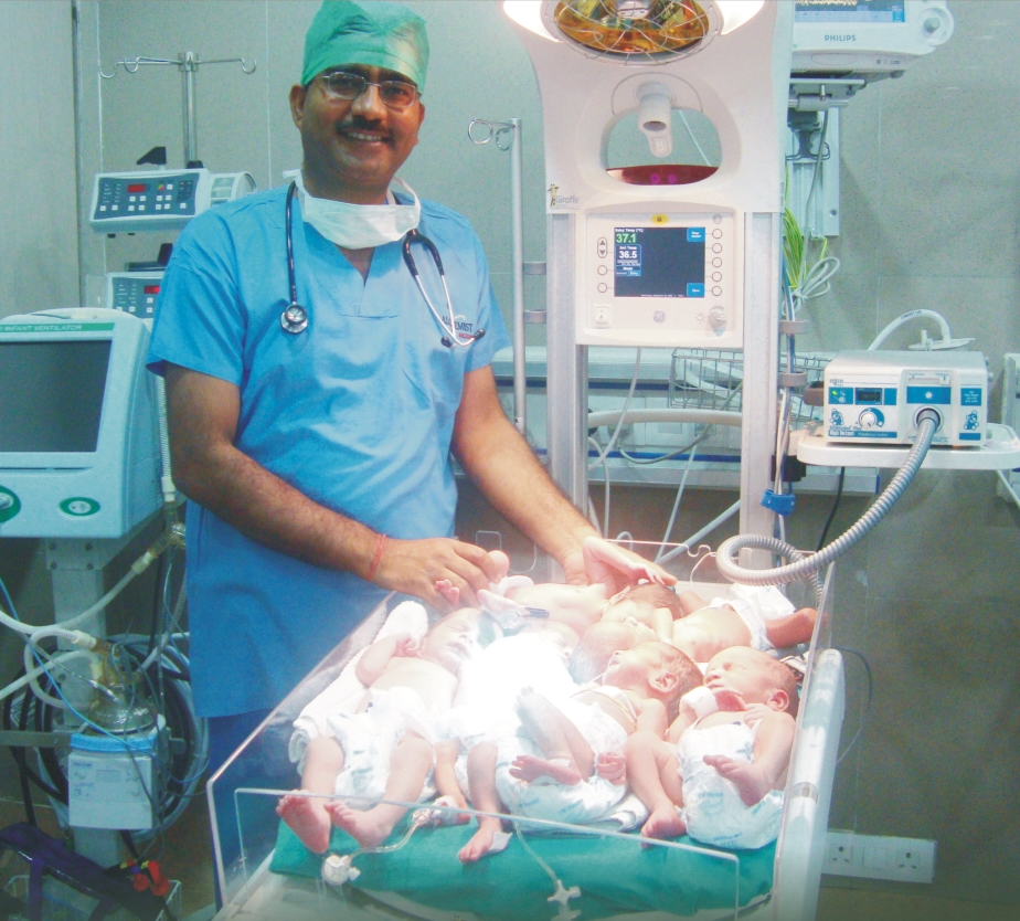Dr. Rishikant Ojha in NICU with newborns
